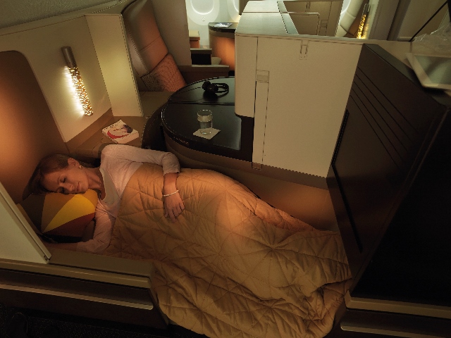 Etihad Airways_B787_Business Studio_Sleeping Female Guest